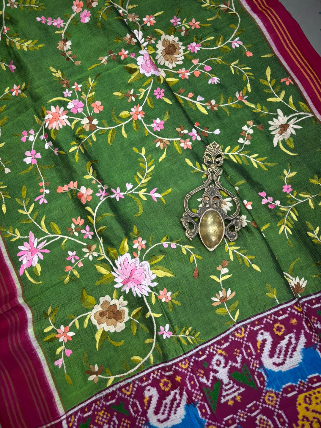 Authentic Double Ikkat Patan Patola Handwoven Saree in Deep Mehendi Green  with Parsi Gara Full Jaal Hand Embroidery and Reddish Pink Border | SILK MARK CERTIFIED | SHOBITAM