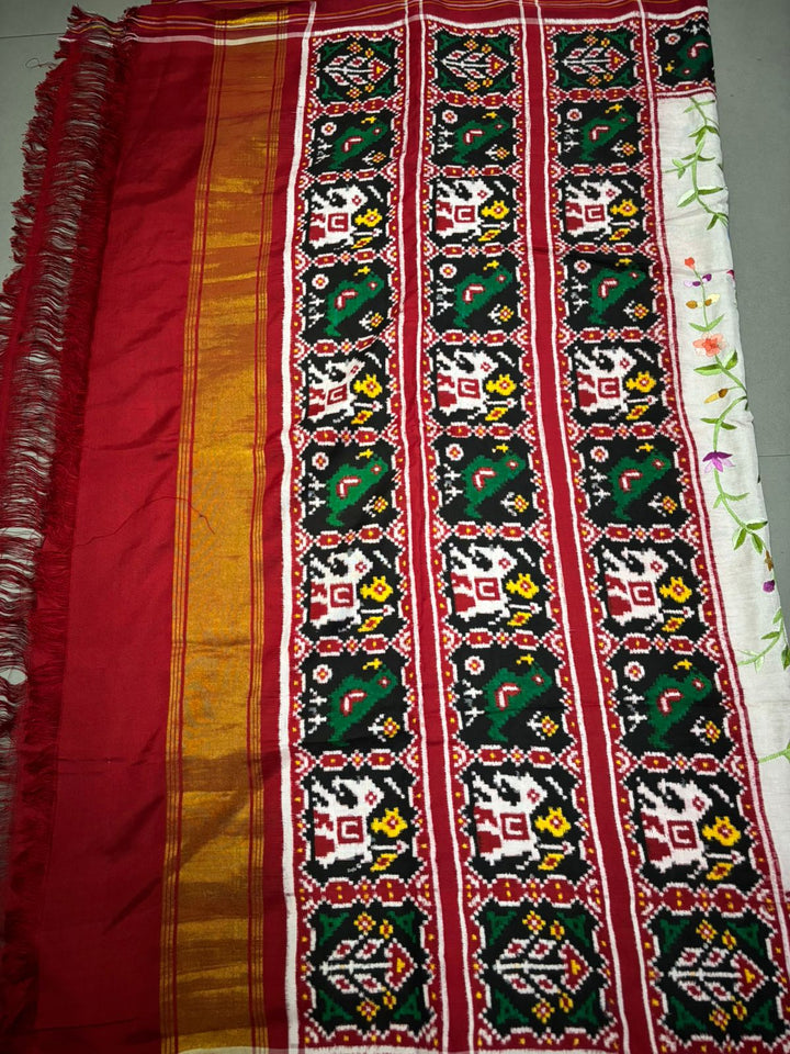 Authentic Double Ikkat Patan Patola Handwoven Saree in Off White with Parsi Gara Hand Embroidery and Patli Pallu   | SILK MARK CERTIFIED | SHOBITAM
