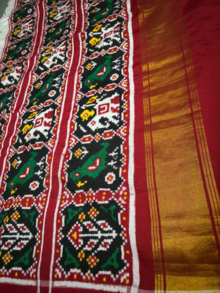Authentic Double Ikkat Patan Patola Handwoven Saree in Off White with Parsi Gara Hand Embroidery and Patli Pallu   | SILK MARK CERTIFIED | SHOBITAM