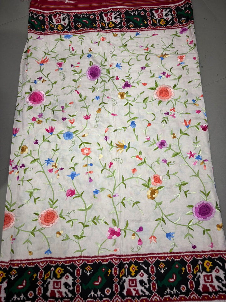Authentic Double Ikkat Patan Patola Handwoven Saree in Off White with Parsi Gara Hand Embroidery and Patli Pallu   | SILK MARK CERTIFIED | SHOBITAM