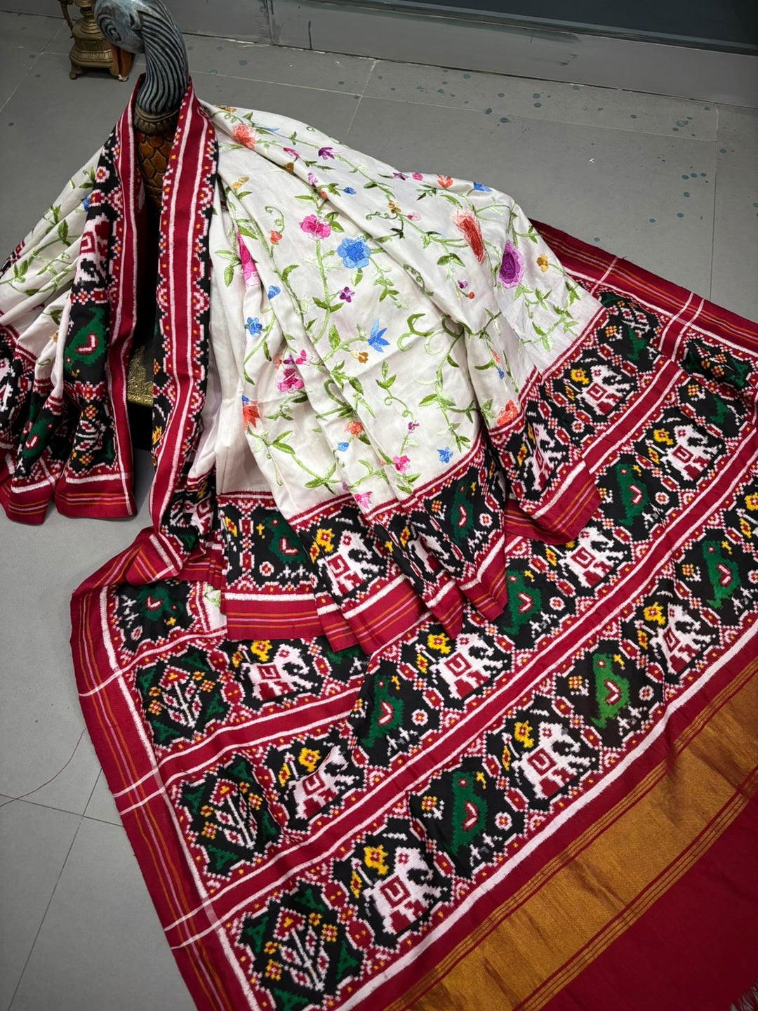 Authentic Double Ikkat Patan Patola Handwoven Saree in Off White with Parsi Gara Hand Embroidery and Patli Pallu   | SILK MARK CERTIFIED | SHOBITAM