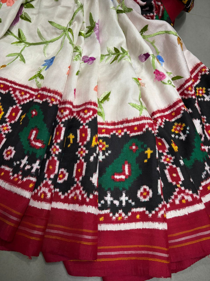 Authentic Double Ikkat Patan Patola Handwoven Saree in Off White with Parsi Gara Hand Embroidery and Patli Pallu   | SILK MARK CERTIFIED | SHOBITAM