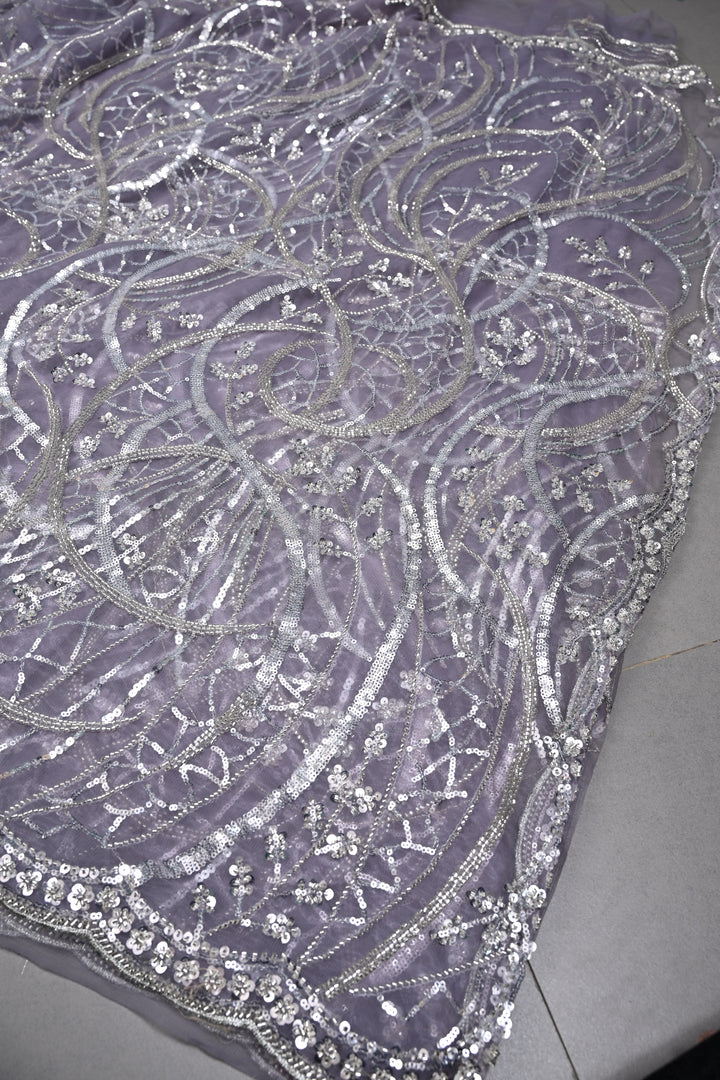 Mauve Swirling Design Sequins, Cutdana Embellishment on Net Saree with Scallop Border