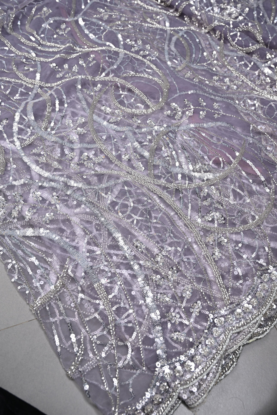 Mauve Swirling Design Sequins, Cutdana Embellishment on Net Saree with Scallop Border