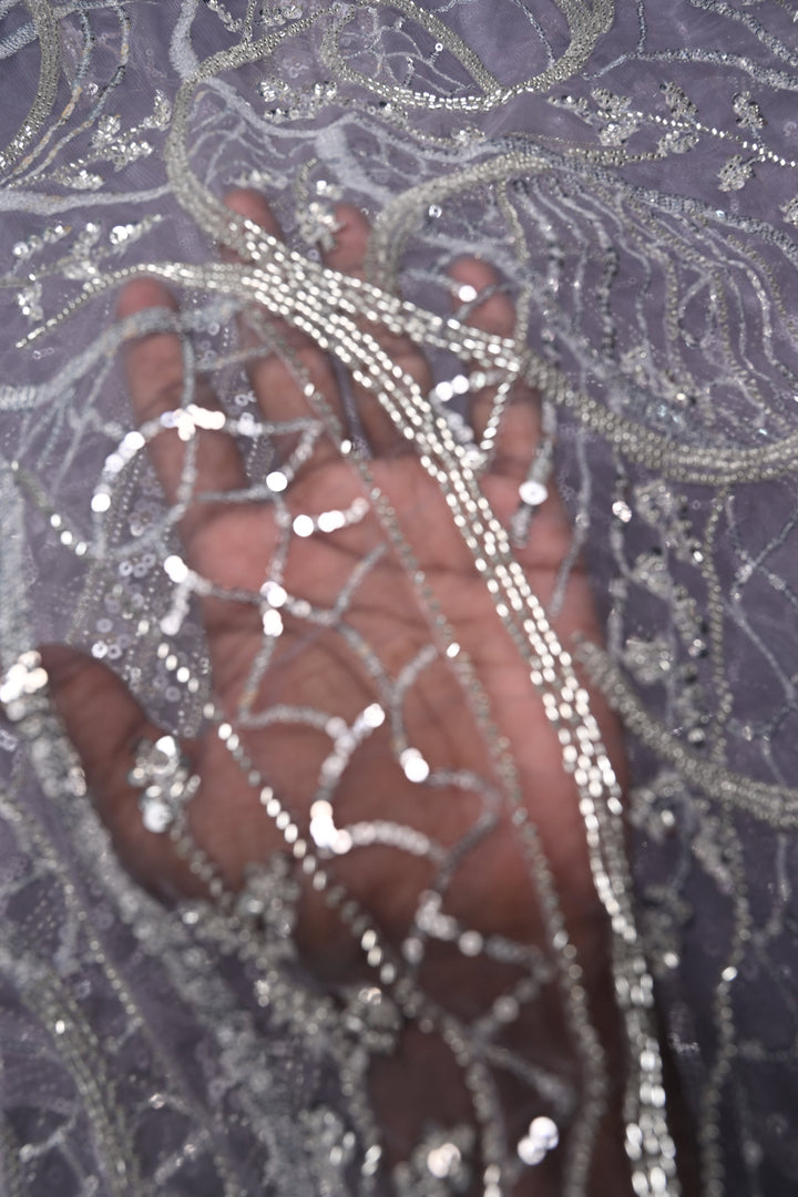 Mauve Swirling Design Sequins, Cutdana Embellishment on Net Saree with Scallop Border