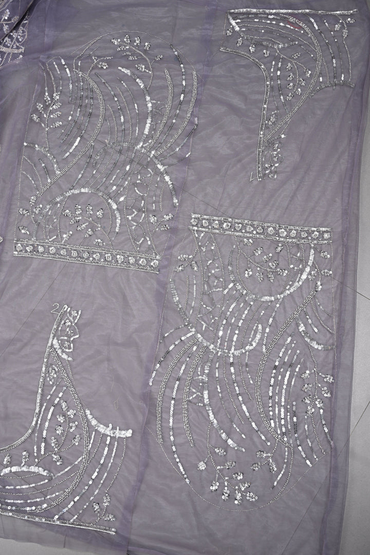 Mauve Swirling Design Sequins, Cutdana Embellishment on Net Saree with Scallop Border