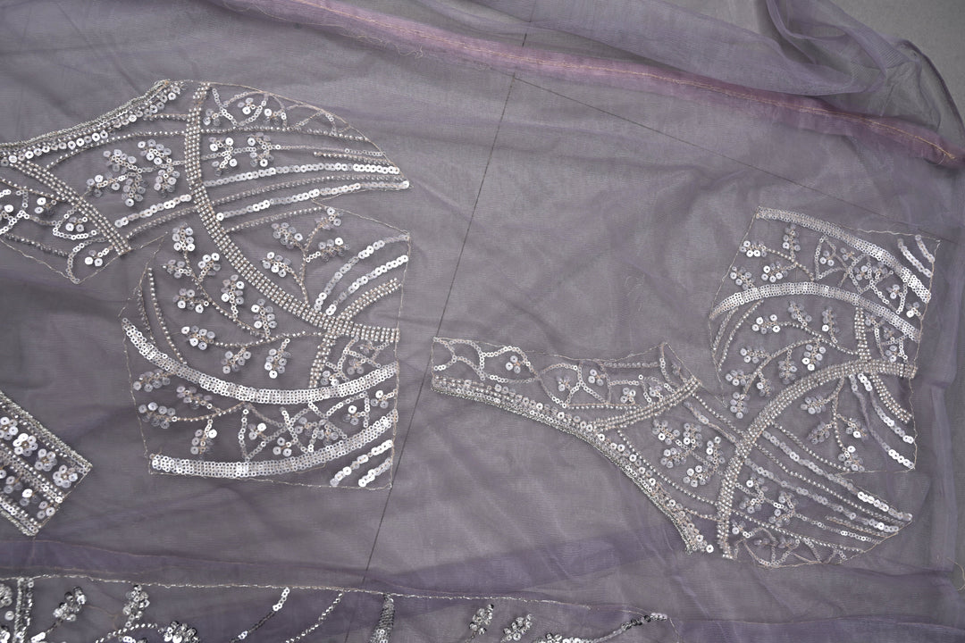 Mauve Swirling Design Sequins, Cutdana Embellishment on Net Saree with Scallop Border