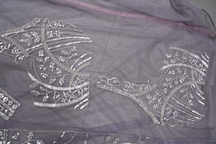 Mauve Swirling Design Sequins, Cutdana Embellishment on Net Saree with Scallop Border