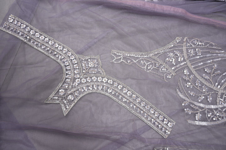 Mauve Swirling Design Sequins, Cutdana Embellishment on Net Saree with Scallop Border