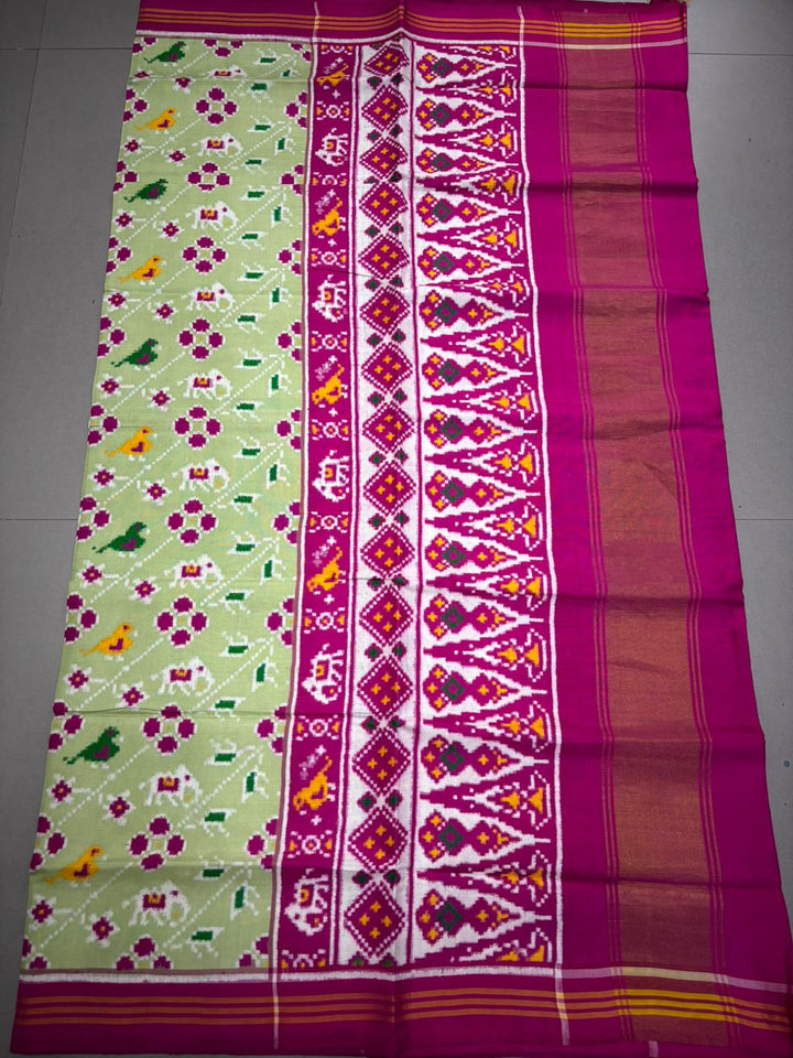 Authentic Double Ikkat Patan Patola Pure Silk Handwoven Patli Pallu Saree in Light Pista Green with Leheria Design and Pink Border | SILK MARK CERTIFIED | SHOBITAM