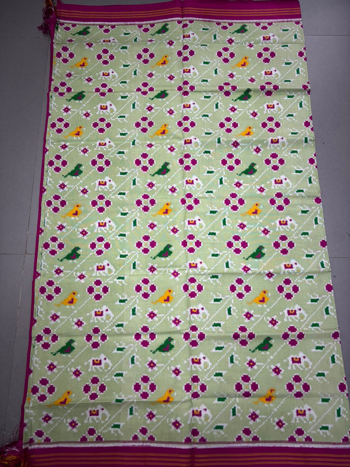 Authentic Double Ikkat Patan Patola Pure Silk Handwoven Patli Pallu Saree in Light Pista Green with Leheria Design and Pink Border | SILK MARK CERTIFIED | SHOBITAM