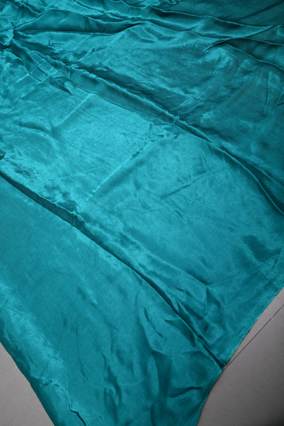 Teal Green Borderless Modal Silk Saree with Lagda Patta Crushed Pallu | SHOBITAM