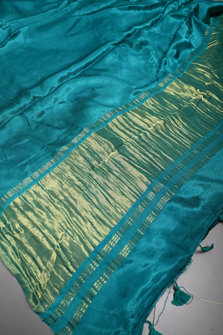 Teal Green Borderless Modal Silk Saree with Lagda Patta Crushed Pallu | SHOBITAM
