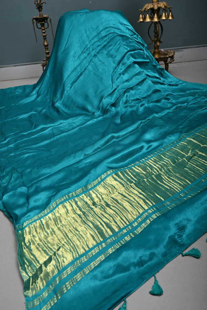 Teal Green Borderless Modal Silk Saree with Lagda Patta Crushed Pallu | SHOBITAM