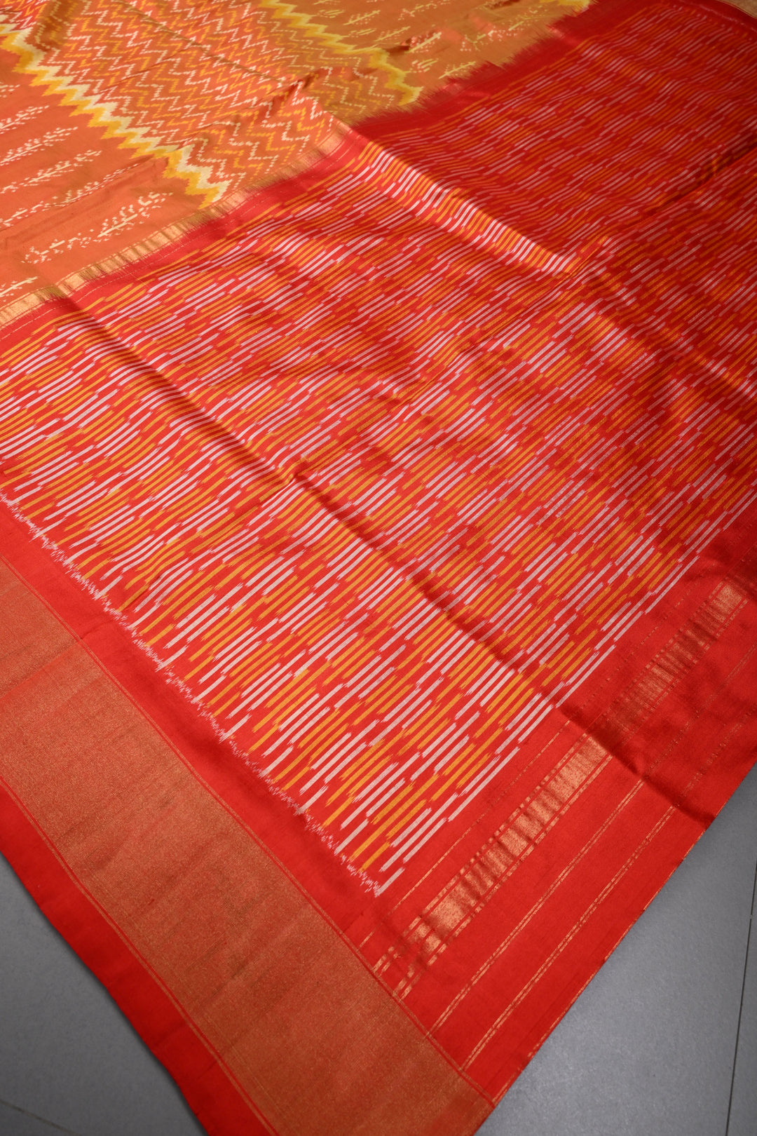 Orange Dual Tone Pochampally Ikkat Pure Silk Saree with Multiple Panel Design and Contrast Tissue Border | SILK MARK CERTIFIED | SHOBITAM