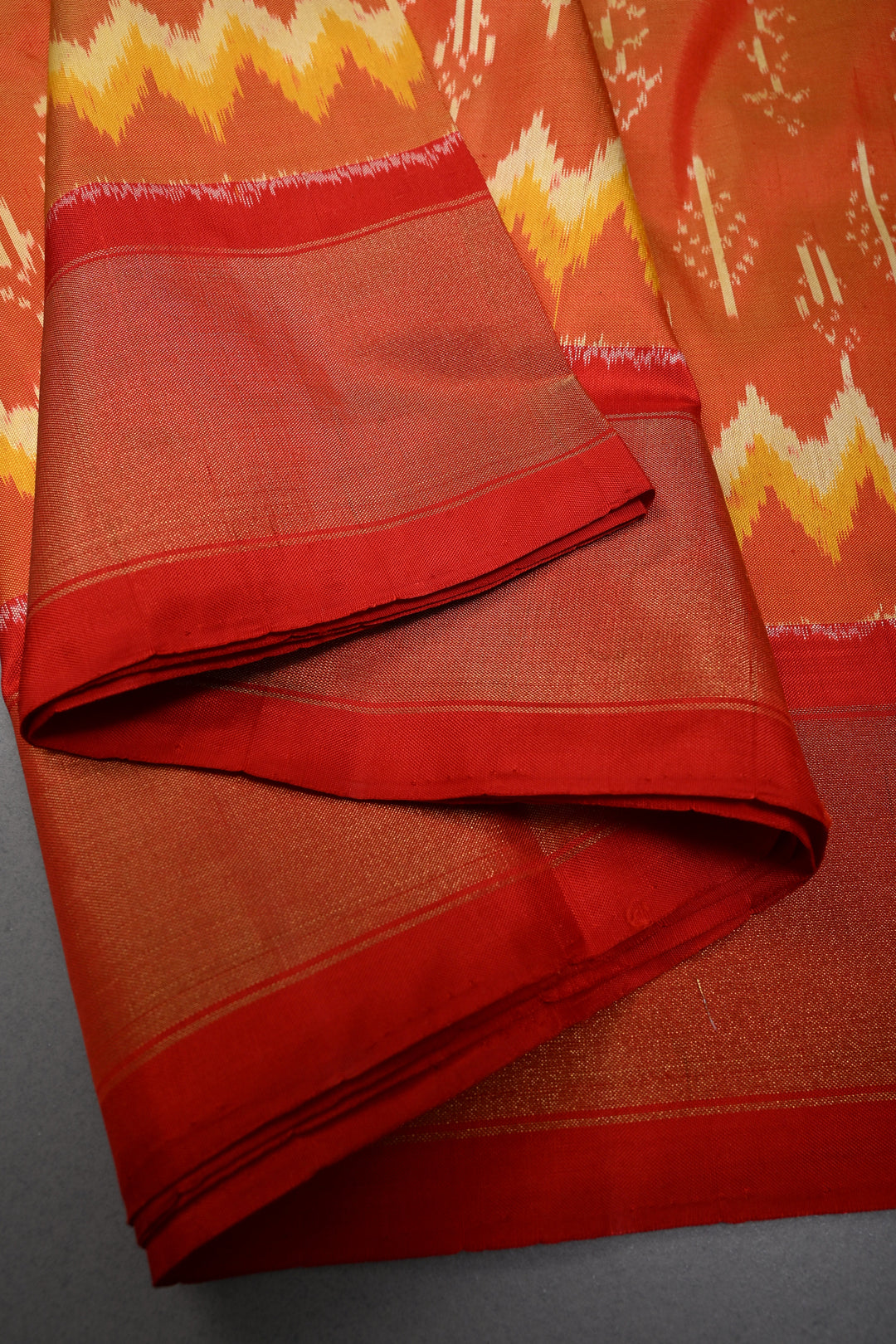 Orange Dual Tone Pochampally Ikkat Pure Silk Saree with Multiple Panel Design and Contrast Tissue Border | SILK MARK CERTIFIED | SHOBITAM