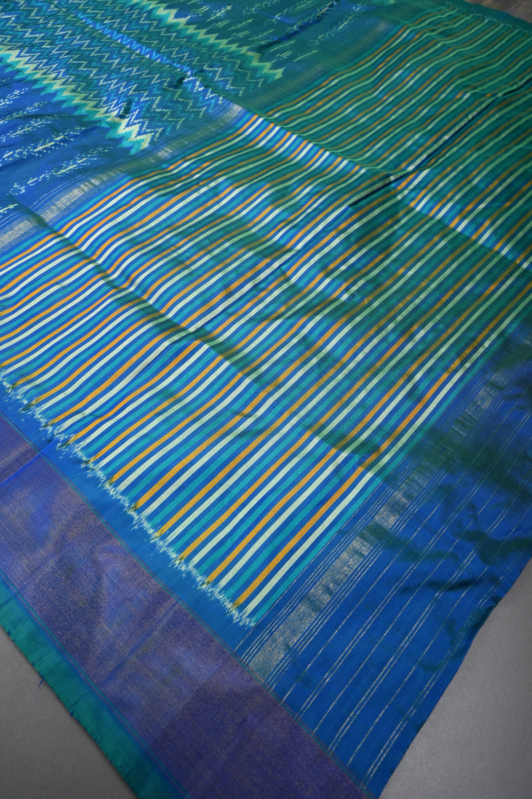 Peacock Blue Dual Tone  Pochampally Ikkat Pure Silk Saree with Multiple Design and Tissue Border | SILK MARK CERTIFIED | SHOBITAM