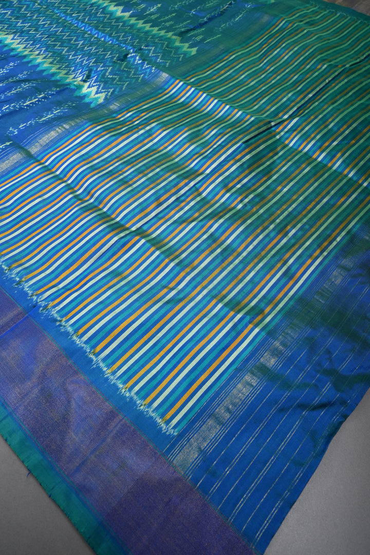 Peacock Blue Dual Tone  Pochampally Ikkat Pure Silk Saree with Multiple Design and Tissue Border | SILK MARK CERTIFIED | SHOBITAM