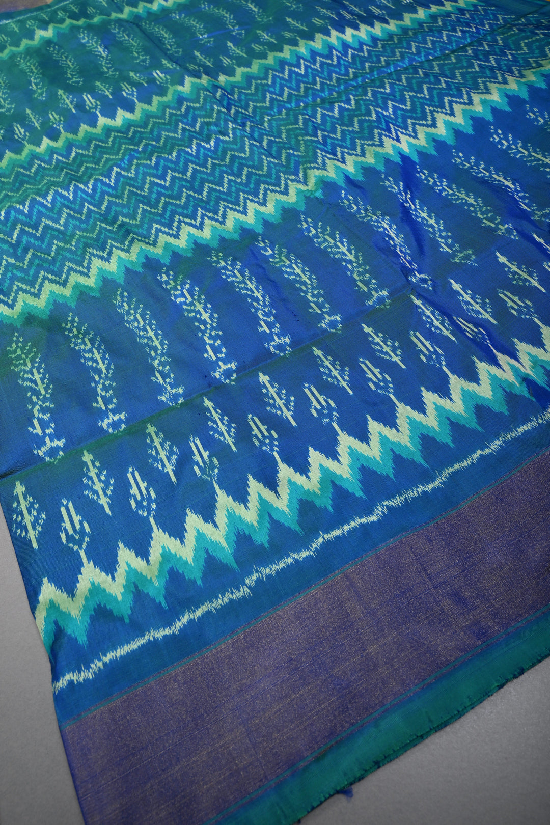 Peacock Blue Dual Tone  Pochampally Ikkat Pure Silk Saree with Multiple Design and Tissue Border | SILK MARK CERTIFIED | SHOBITAM