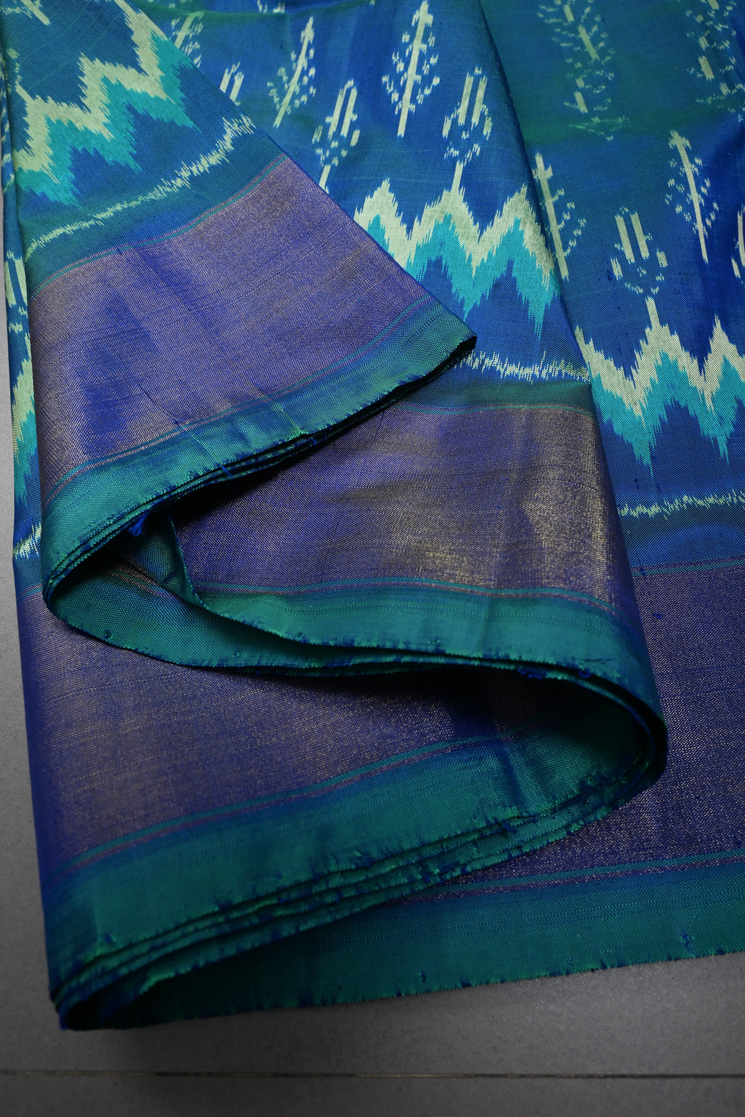 Peacock Blue Dual Tone  Pochampally Ikkat Pure Silk Saree with Multiple Design and Tissue Border | SILK MARK CERTIFIED | SHOBITAM