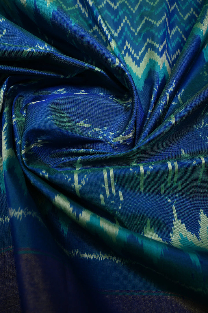 Peacock Blue Dual Tone  Pochampally Ikkat Pure Silk Saree with Multiple Design and Tissue Border | SILK MARK CERTIFIED | SHOBITAM
