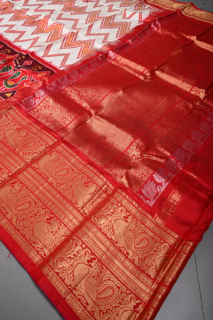 Off White Pochampally Ikkat Pure Silk Fusion Saree with Chevron and Panel Design on Contrast Kanjivaram Zari Border | SILK MARK CERTIFIED | SHOBITAM