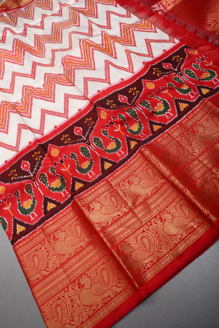 Off White Pochampally Ikkat Pure Silk Fusion Saree with Chevron and Panel Design on Contrast Kanjivaram Zari Border | SILK MARK CERTIFIED | SHOBITAM