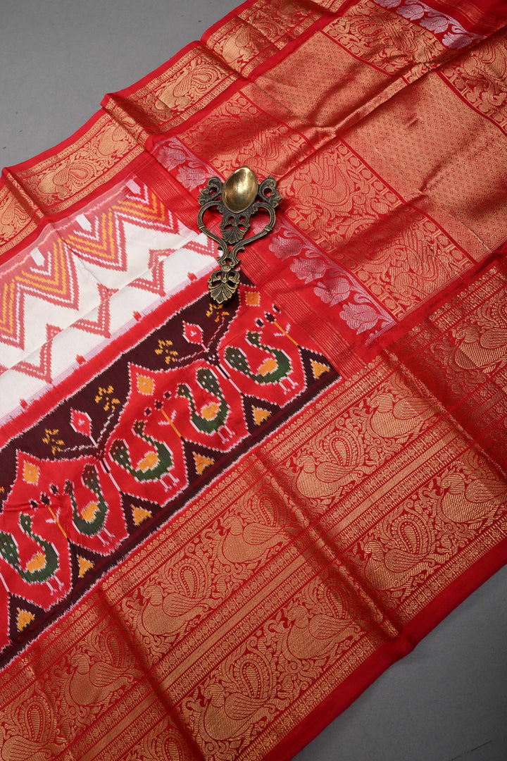 Off White Pochampally Ikkat Pure Silk Fusion Saree with Chevron and Panel Design on Contrast Kanjivaram Zari Border | SILK MARK CERTIFIED | SHOBITAM