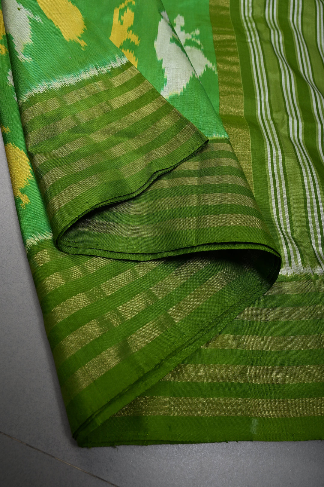 Parrot Green Pochampally Ikkat Pure Silk Saree with Meenakari Dancing Ladies Design and Stripes Zari Border | SILK MARK CERTIFIED | SHOBITAM