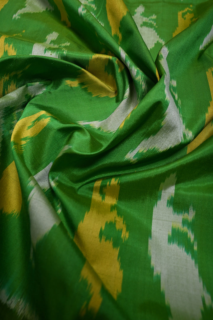 Parrot Green Pochampally Ikkat Pure Silk Saree with Meenakari Dancing Ladies Design and Stripes Zari Border | SILK MARK CERTIFIED | SHOBITAM