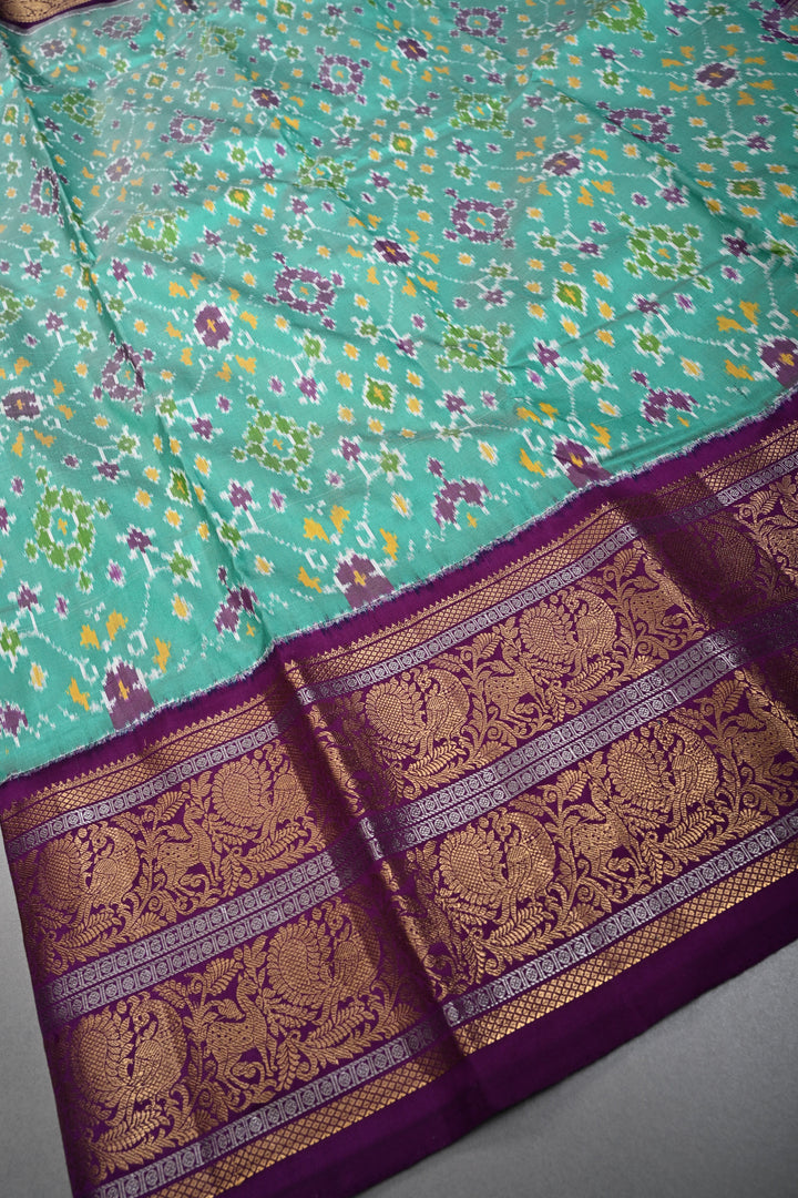Mint Green Pochampally Ikkat Pure Silk Fusion Saree with Geometric Brocade and Contrast Kanjivaram Zari Border | SILK MARK CERTIFIED | SHOBITAM