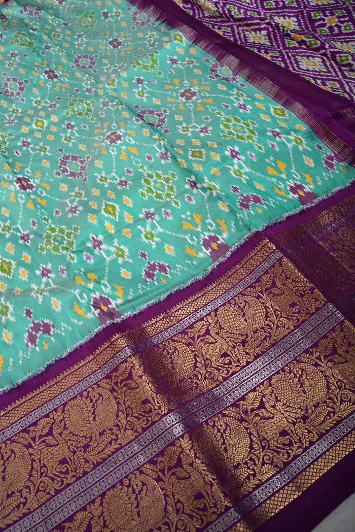 Mint Green Pochampally Ikkat Pure Silk Fusion Saree with Geometric Brocade and Contrast Kanjivaram Zari Border | SILK MARK CERTIFIED | SHOBITAM
