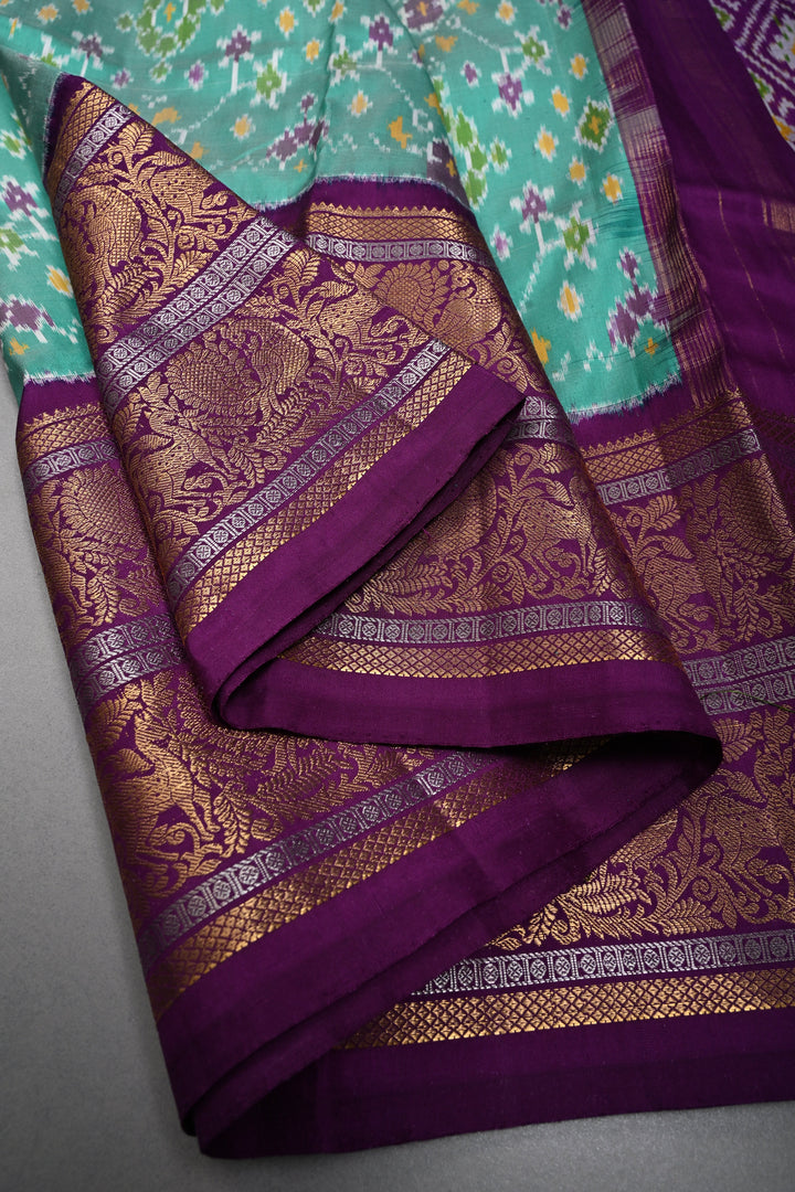 Mint Green Pochampally Ikkat Pure Silk Fusion Saree with Geometric Brocade and Contrast Kanjivaram Zari Border | SILK MARK CERTIFIED | SHOBITAM