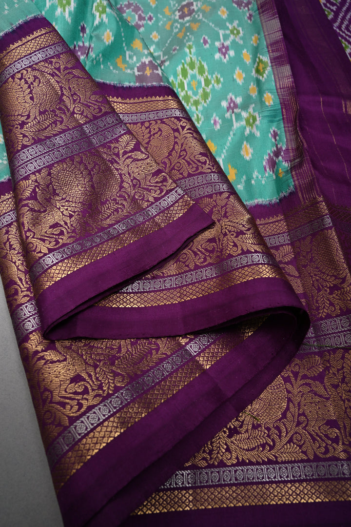 Mint Green Pochampally Ikkat Pure Silk Fusion Saree with Geometric Brocade and Contrast Kanjivaram Zari Border | SILK MARK CERTIFIED | SHOBITAM