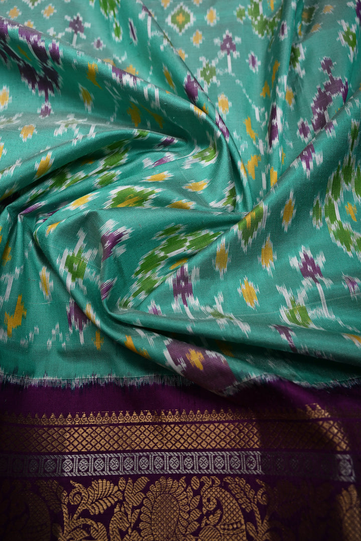 Mint Green Pochampally Ikkat Pure Silk Fusion Saree with Geometric Brocade and Contrast Kanjivaram Zari Border | SILK MARK CERTIFIED | SHOBITAM