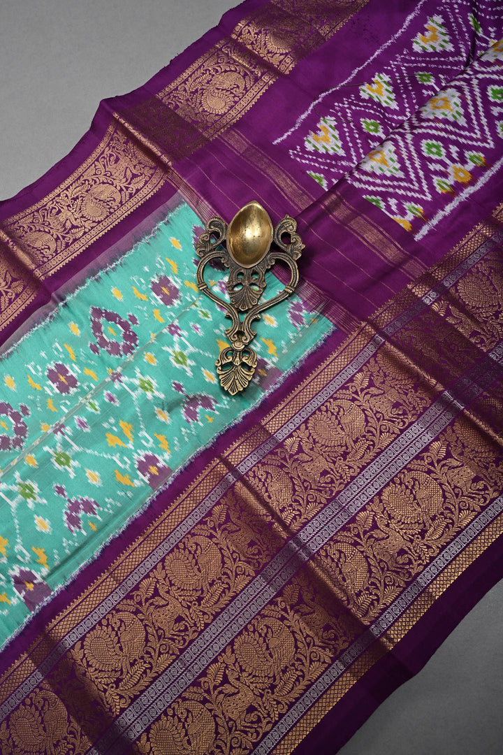 Mint Green Pochampally Ikkat Pure Silk Fusion Saree with Geometric Brocade and Contrast Kanjivaram Zari Border | SILK MARK CERTIFIED | SHOBITAM