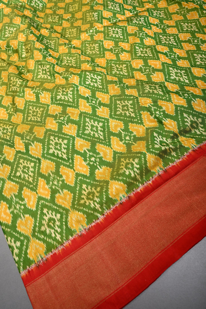 Leaf Green Dual Tone  Pochampally Ikkat Pure Silk Saree with Geometric Brocade and Contrast Tissue Border | SILK MARK CERTIFIED | SHOBITAM
