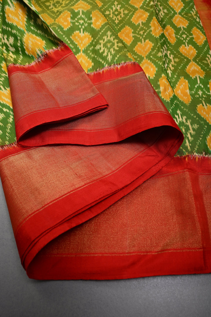 Leaf Green Dual Tone  Pochampally Ikkat Pure Silk Saree with Geometric Brocade and Contrast Tissue Border | SILK MARK CERTIFIED | SHOBITAM