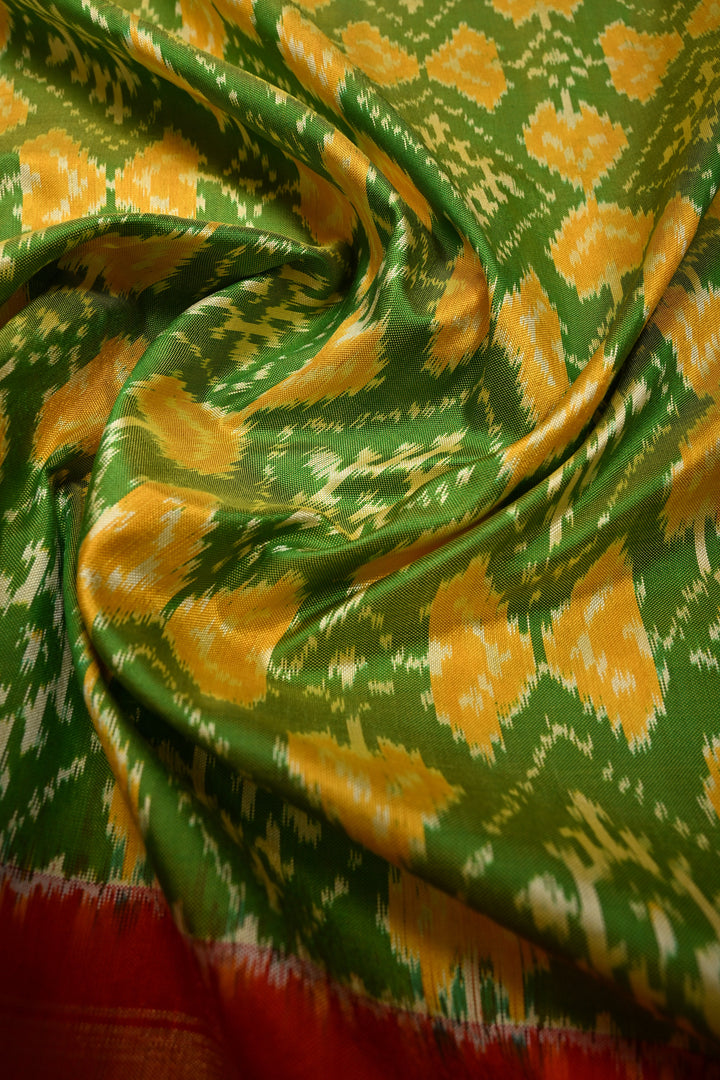 Leaf Green Dual Tone  Pochampally Ikkat Pure Silk Saree with Geometric Brocade and Contrast Tissue Border | SILK MARK CERTIFIED | SHOBITAM
