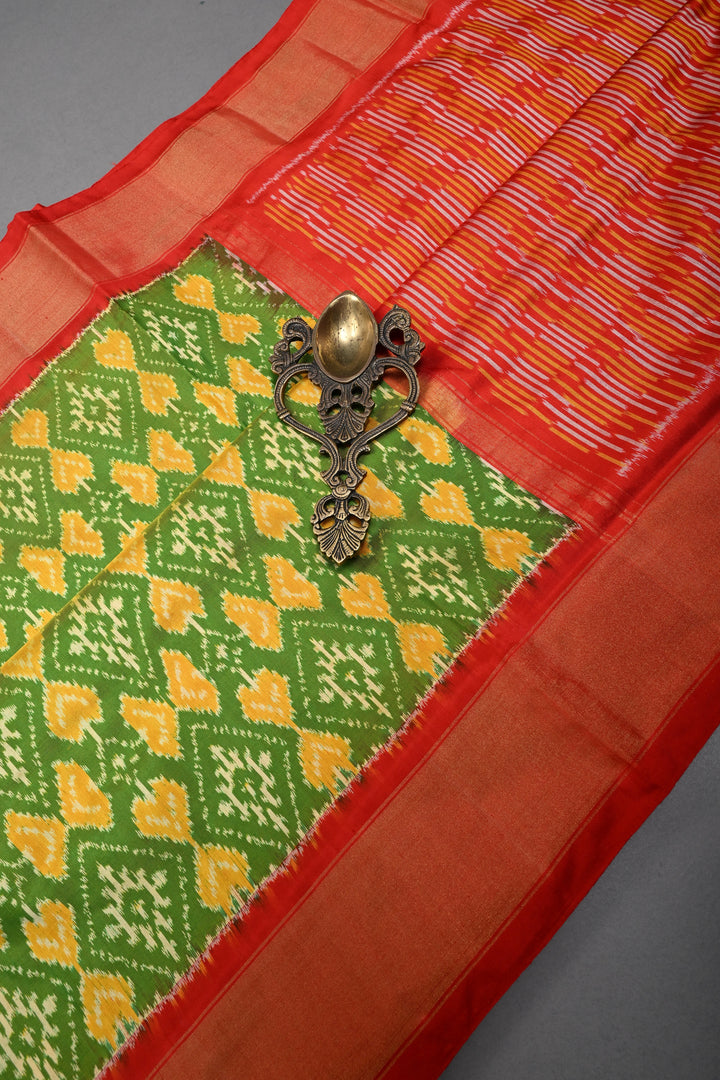 Leaf Green Dual Tone  Pochampally Ikkat Pure Silk Saree with Geometric Brocade and Contrast Tissue Border | SILK MARK CERTIFIED | SHOBITAM