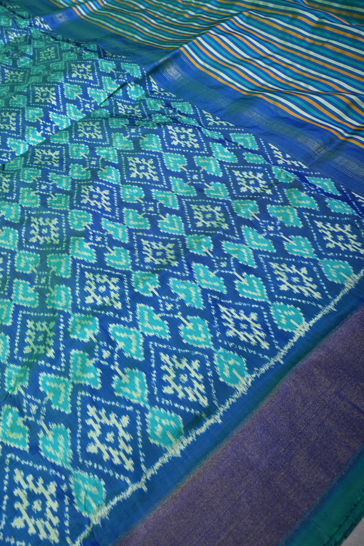 Blue-Green Dual Tone Pochampally Ikkat Pure Silk Saree with Geometric Brocade and Tissue Border | SILK MARK CERTIFIED | SHOBITAM