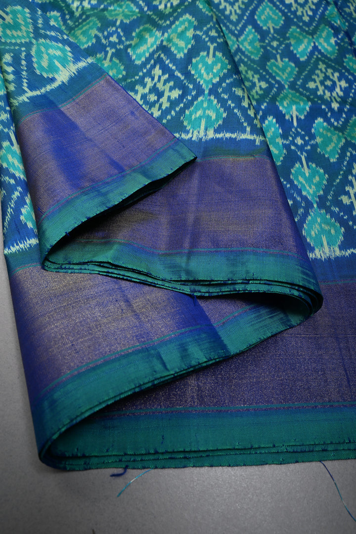 Blue-Green Dual Tone Pochampally Ikkat Pure Silk Saree with Geometric Brocade and Tissue Border | SILK MARK CERTIFIED | SHOBITAM