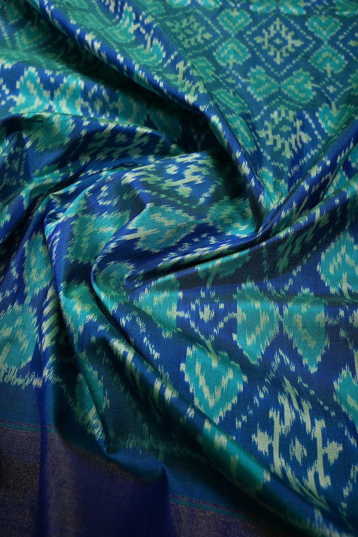Blue-Green Dual Tone Pochampally Ikkat Pure Silk Saree with Geometric Brocade and Tissue Border | SILK MARK CERTIFIED | SHOBITAM