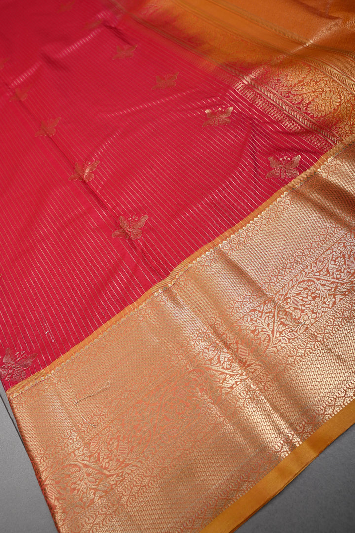 Reddish Pink Dual tone Zari Stripes on Kanjivaram Soft Semi Silk Saree with Butterfly Zari Buttas and Contrast Zari Border | SHOBITAM
