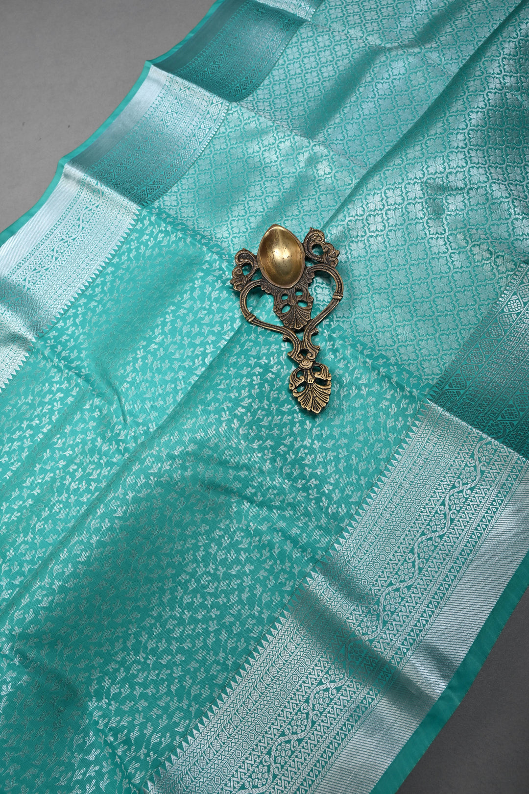 Sea Green Kanjivaram Soft Semi Silk Saree with Floral Brocade and Silver Zari Border | SHOBITAM