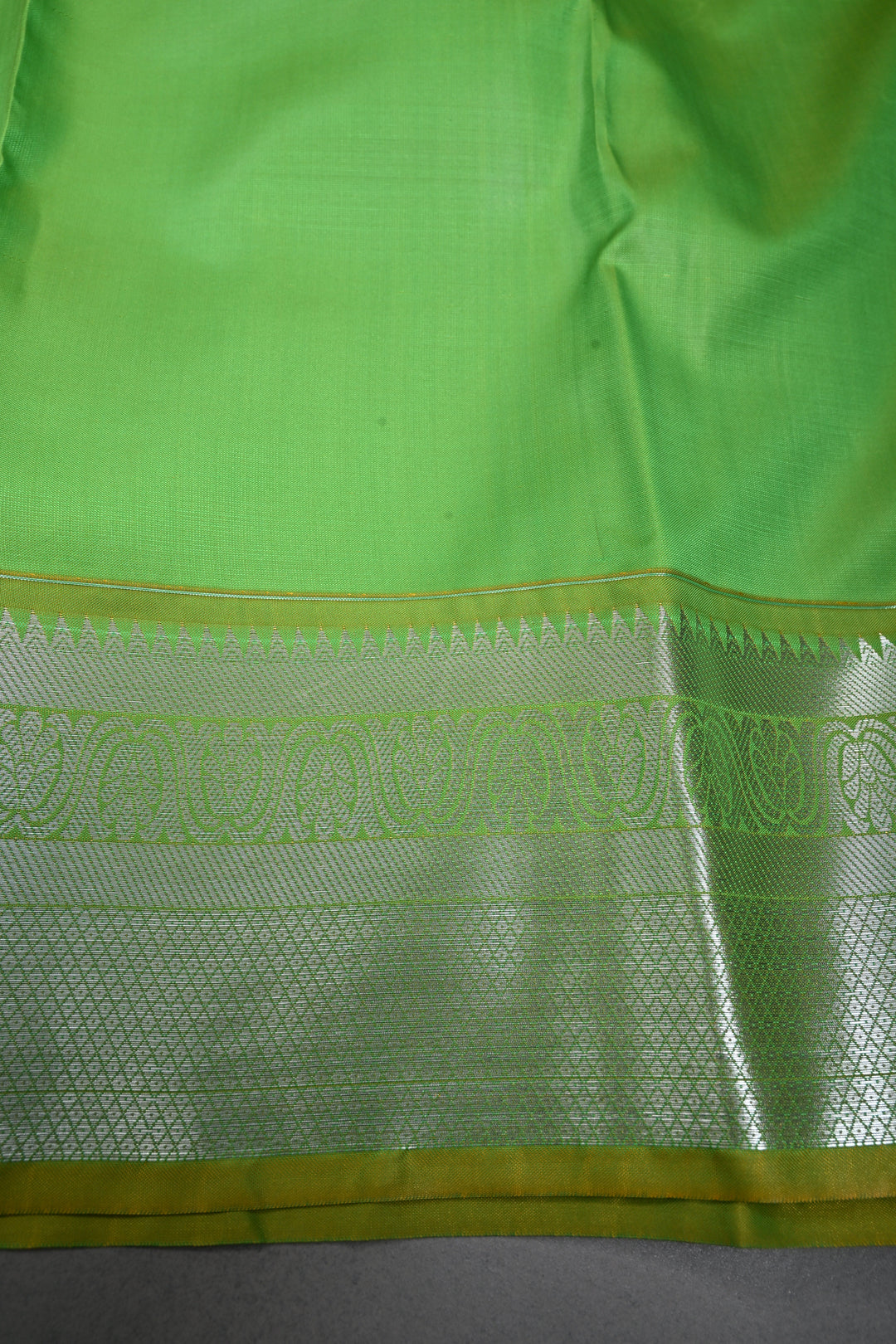 Parrot Green Kanjivaram Soft Semi Silk Saree with Floral Brocade Jaal and Silver Zari Border | SHOBITAM