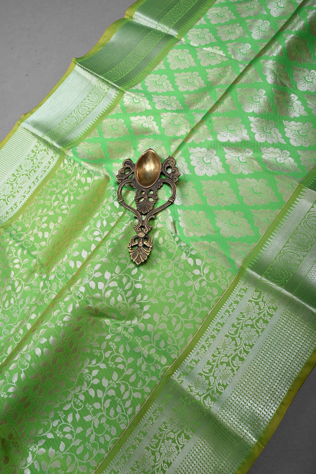 Parrot Green Kanjivaram Soft Semi Silk Saree with Floral Brocade Jaal and Silver Zari Border | SHOBITAM