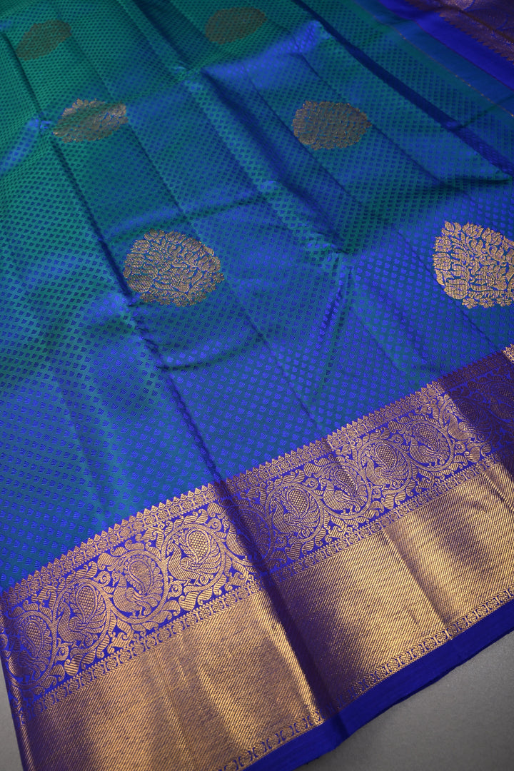 Blue-Green Dual Tone Self Brocade on Pure Kanjivaram Silk Handloom Saree with Zari Buttas and Zari Border| SILK MARK CERTIFIED | SHOBITAM