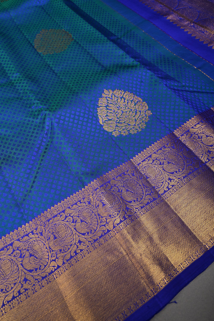 Blue-Green Dual Tone Self Brocade on Pure Kanjivaram Silk Handloom Saree with Zari Buttas and Zari Border| SILK MARK CERTIFIED | SHOBITAM