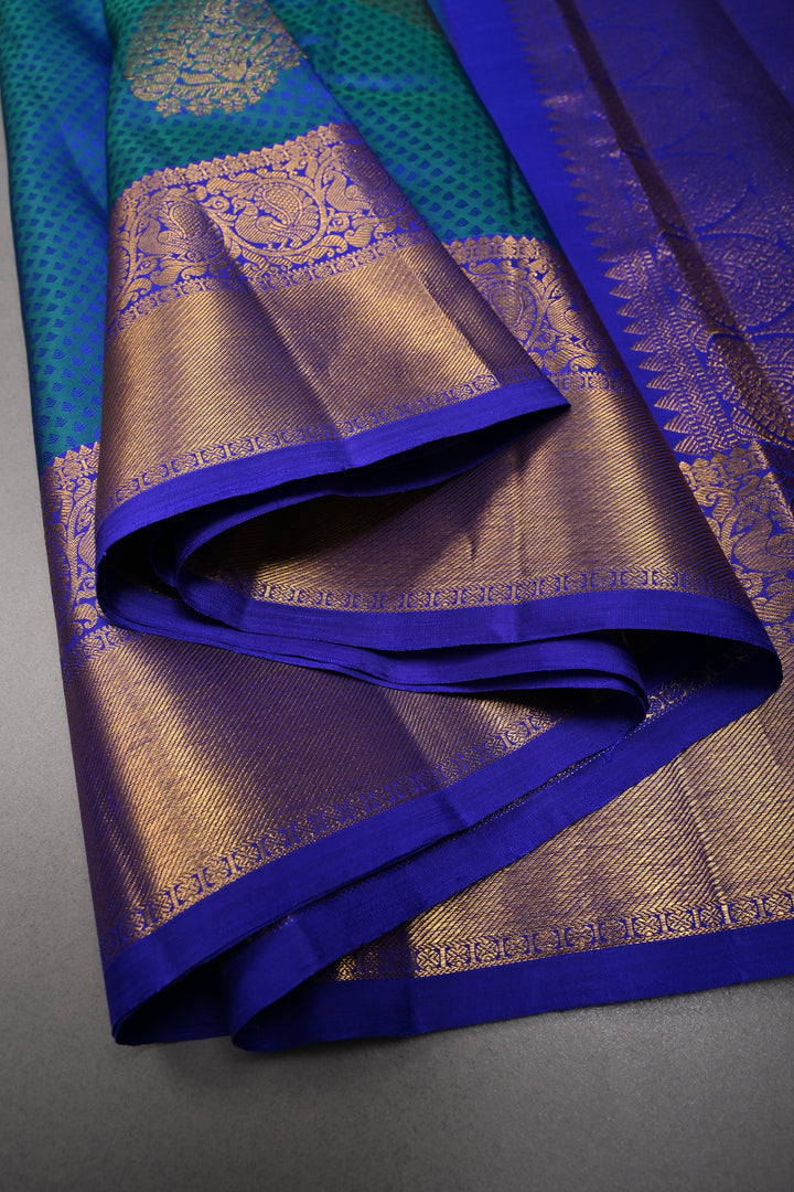 Blue-Green Dual Tone Self Brocade on Pure Kanjivaram Silk Handloom Saree with Zari Buttas and Zari Border| SILK MARK CERTIFIED | SHOBITAM